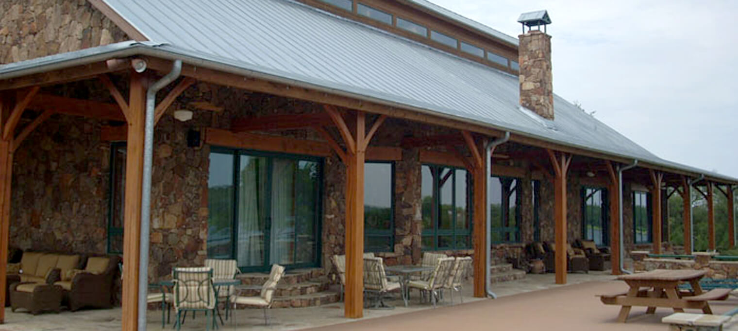 timber frame home exterior leanto porch big game greatroom 6