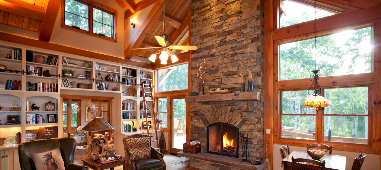timber frame home living room fireplace mountain retreat 2