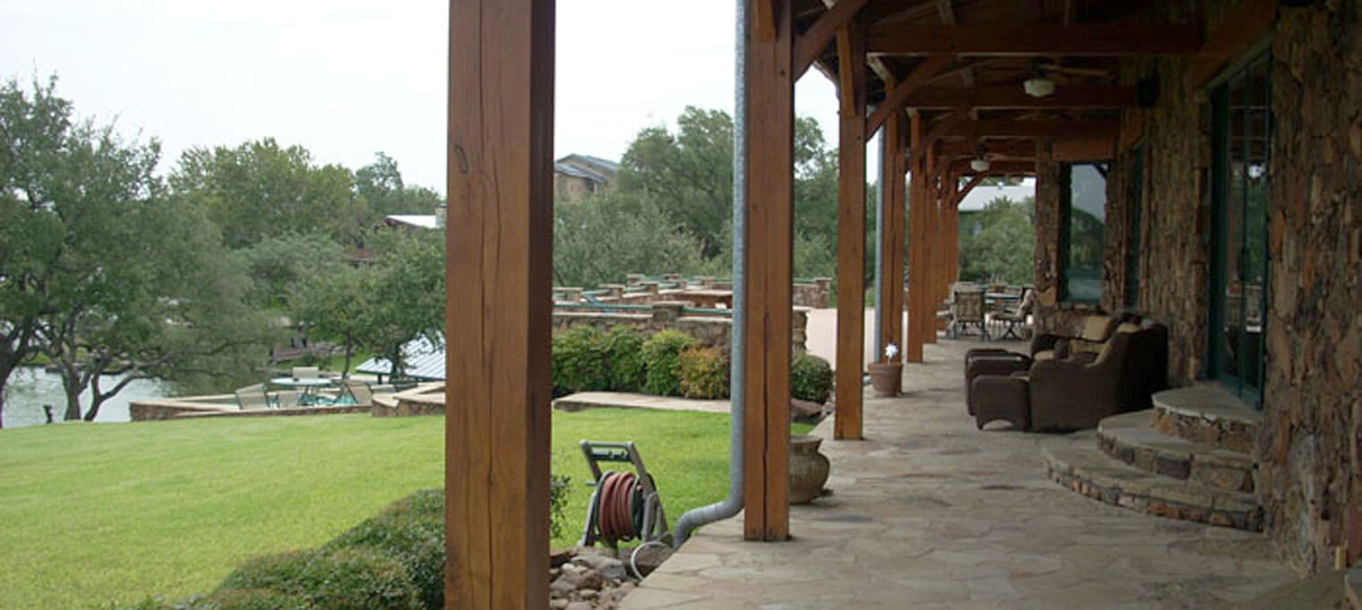 timber frame home outdoor seating porch big game 9