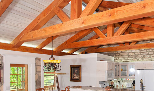 timber frame home stone house